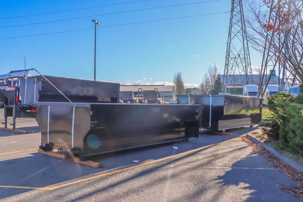 Roll-off dumpster ready for waste disposal at job site for 12 Yard Dumpster Rental in Orem